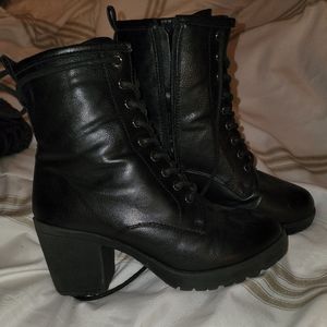 Black heeled combat boots